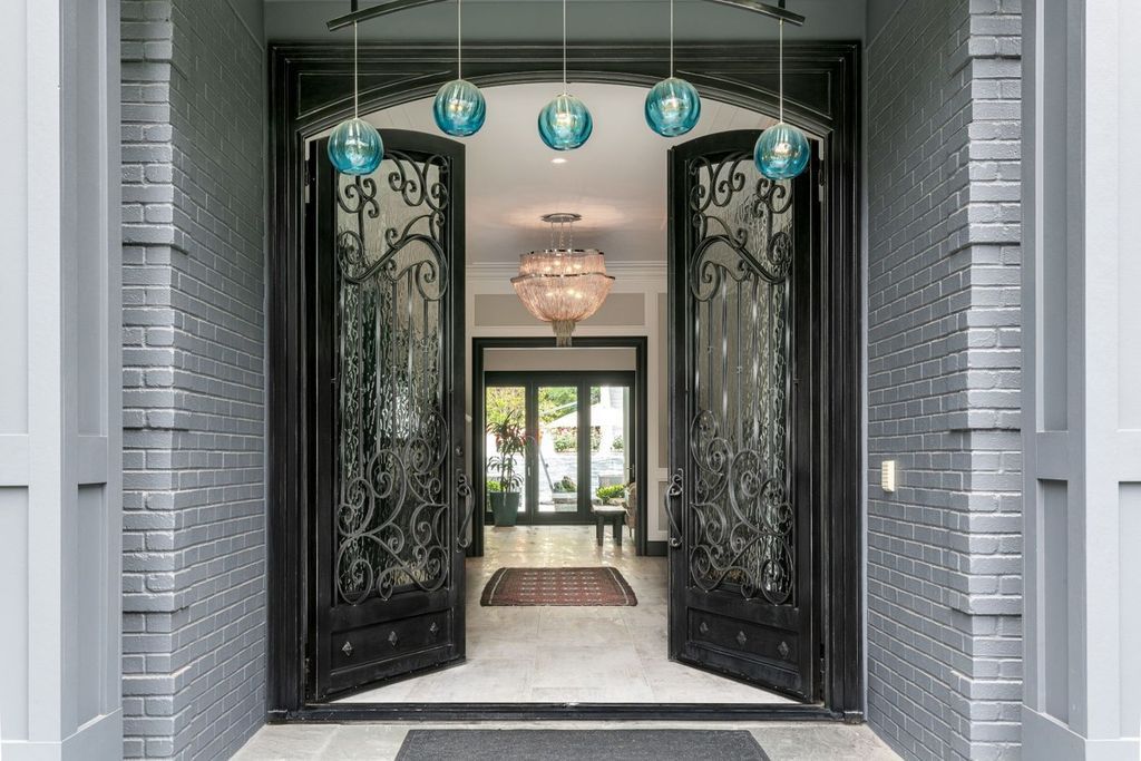 The Encino Home is a sophisticated property in the prestigious Royal Oaks community with a palatial layout provides comfortable space now available for sale. This home located at 16133 High Valley Pl, Encino, California; offering 7 bedrooms and 10 bathrooms with over 8,500 square feet of living spaces.