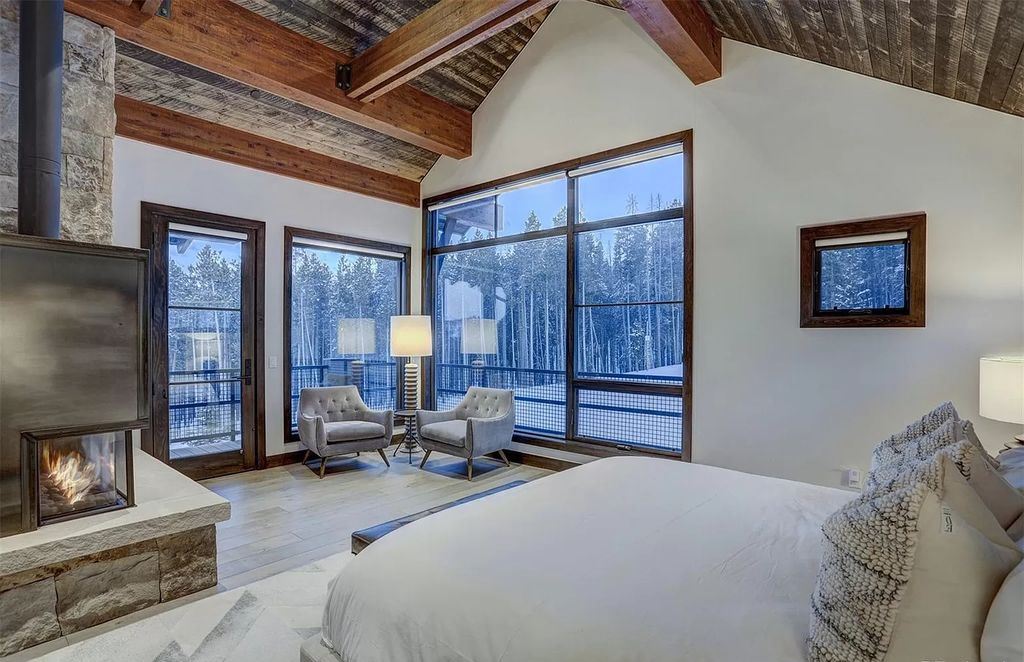 The Colorado Mountain Home is a true custom ski home with total privacy and heated back patio made for entertaining now available for sale. This home located at 460 Timber Trail Rd, Breckenridge, Colorado