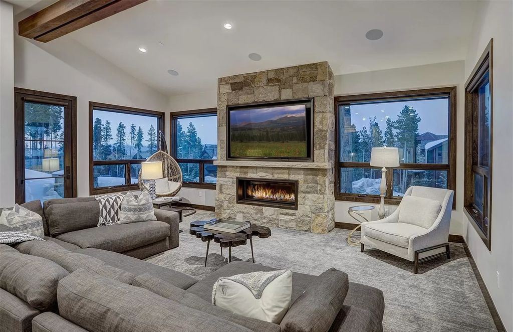 The Colorado Mountain Home is a true custom ski home with total privacy and heated back patio made for entertaining now available for sale. This home located at 460 Timber Trail Rd, Breckenridge, Colorado