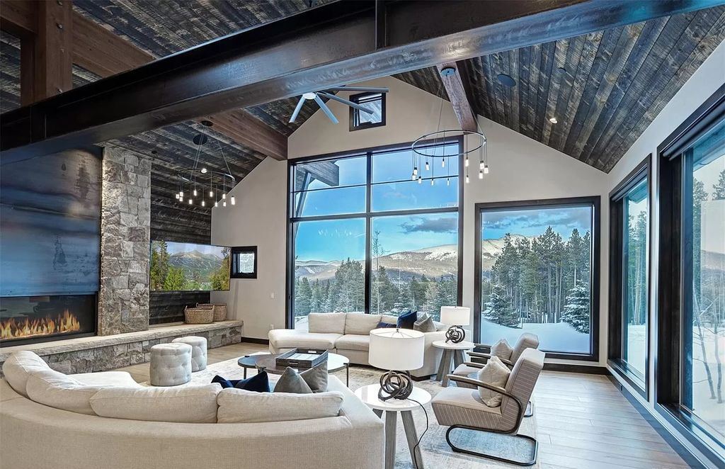 The Colorado Mountain Home is a true custom ski home with total privacy and heated back patio made for entertaining now available for sale. This home located at 460 Timber Trail Rd, Breckenridge, Colorado