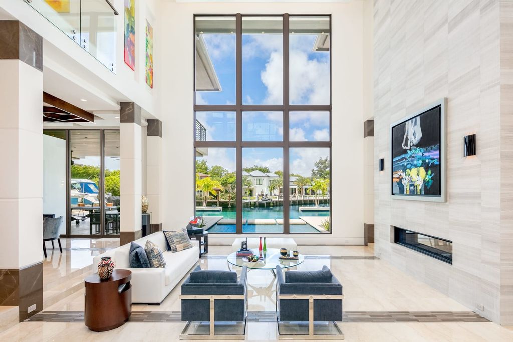 The Fort Lauderdale Home is a stunning estate nestled in the exclusive Bay Colony community perfect for entertaining now available for sale. This home located at 20 Compass Is, Fort Lauderdale, Florida