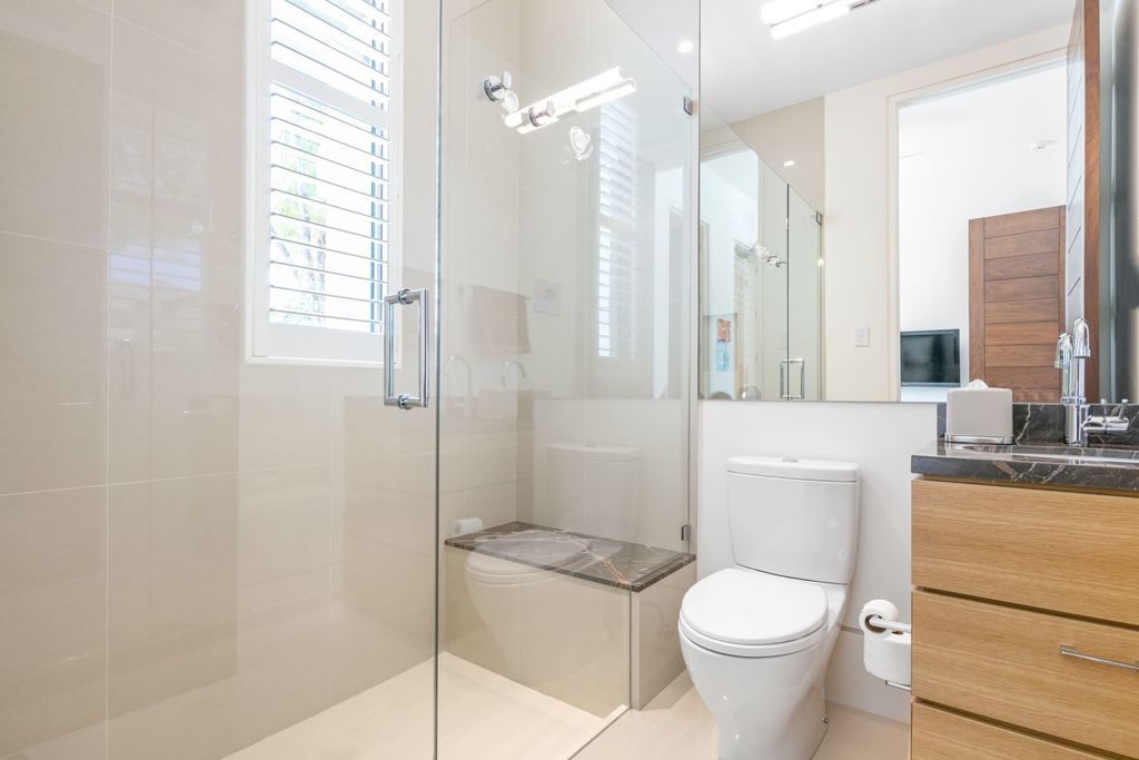 The Fort Lauderdale Home is a stunning estate nestled in the exclusive Bay Colony community perfect for entertaining now available for sale. This home located at 20 Compass Is, Fort Lauderdale, Florida