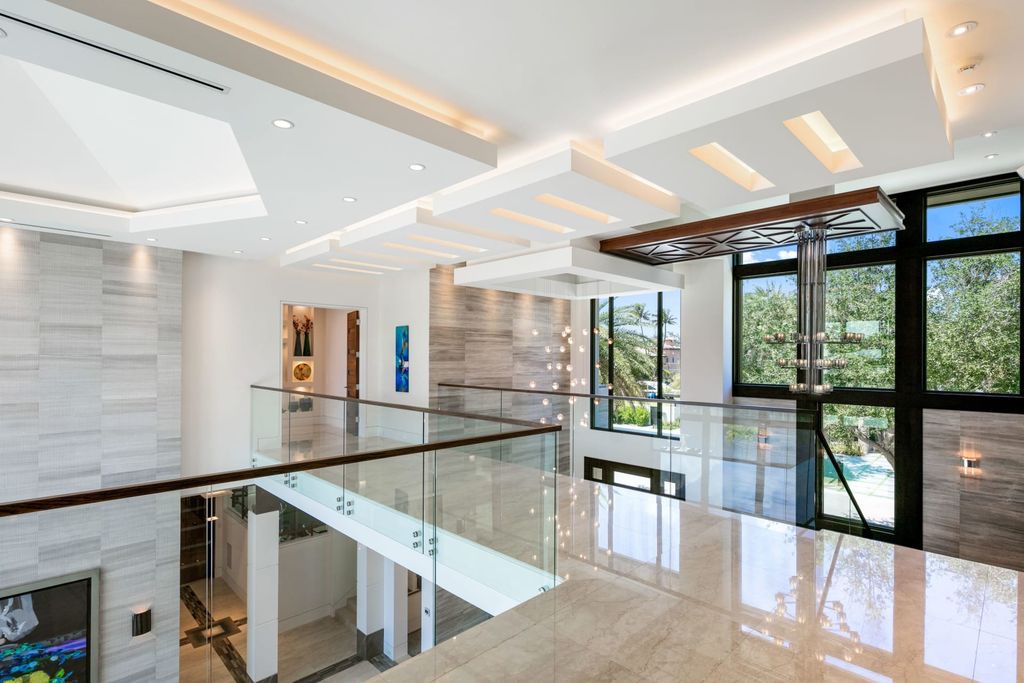 The Fort Lauderdale Home is a stunning estate nestled in the exclusive Bay Colony community perfect for entertaining now available for sale. This home located at 20 Compass Is, Fort Lauderdale, Florida