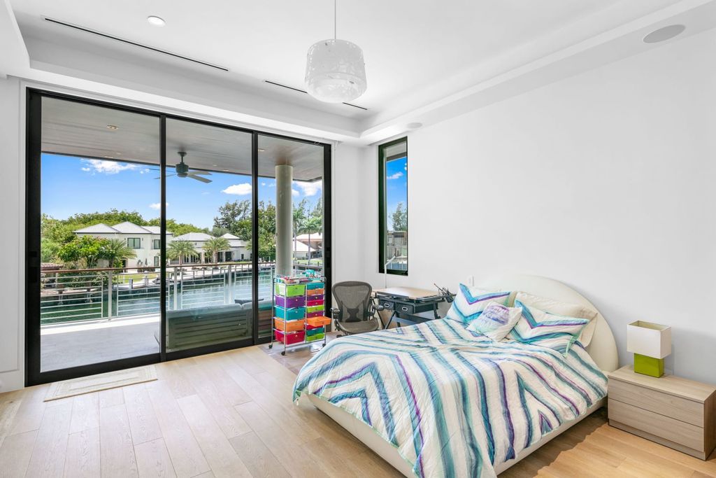 The Fort Lauderdale Home is a stunning estate nestled in the exclusive Bay Colony community perfect for entertaining now available for sale. This home located at 20 Compass Is, Fort Lauderdale, Florida