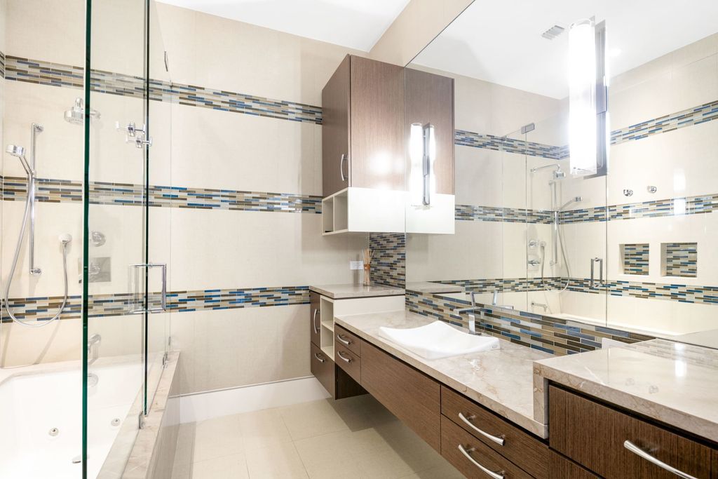 The Fort Lauderdale Home is a stunning estate nestled in the exclusive Bay Colony community perfect for entertaining now available for sale. This home located at 20 Compass Is, Fort Lauderdale, Florida