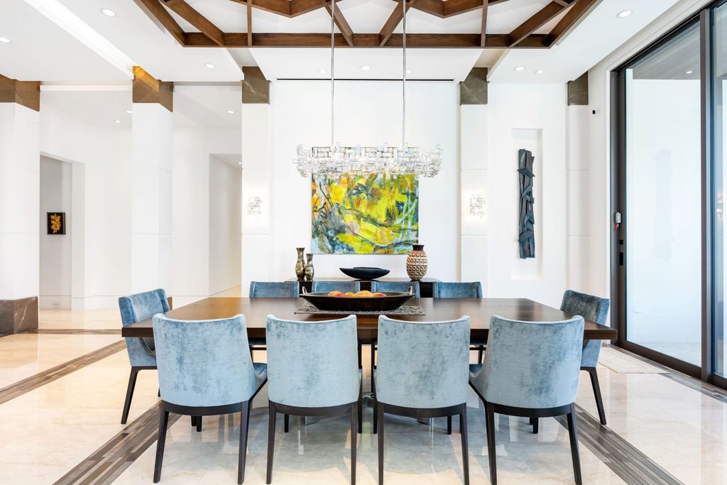 The Fort Lauderdale Home is a stunning estate nestled in the exclusive Bay Colony community perfect for entertaining now available for sale. This home located at 20 Compass Is, Fort Lauderdale, Florida