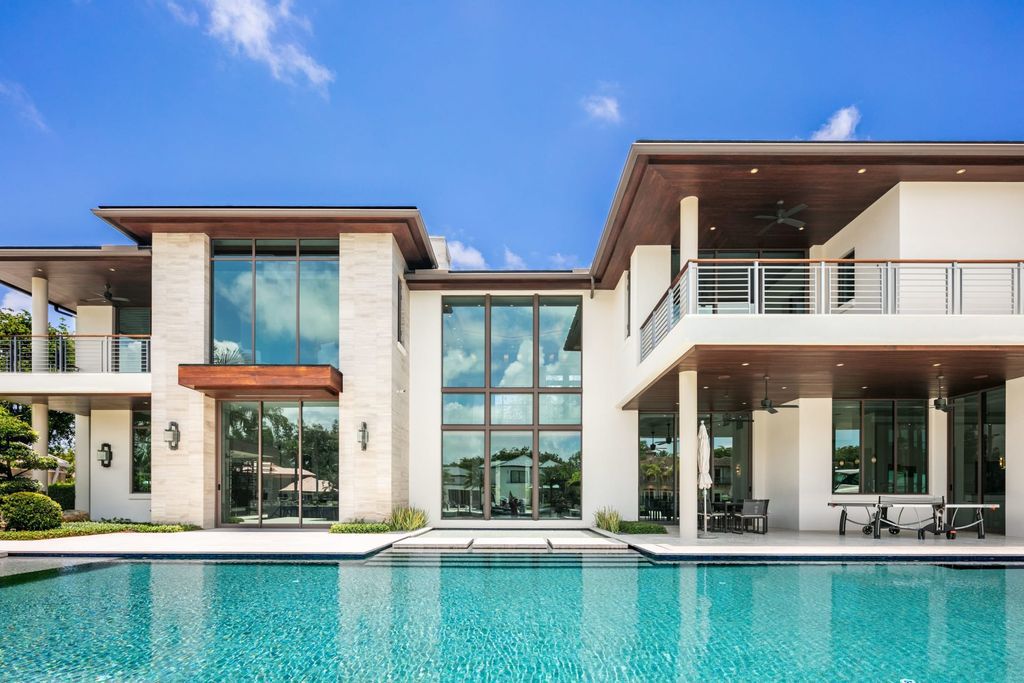 The Fort Lauderdale Home is a stunning estate nestled in the exclusive Bay Colony community perfect for entertaining now available for sale. This home located at 20 Compass Is, Fort Lauderdale, Florida