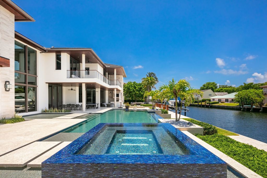 The Fort Lauderdale Home is a stunning estate nestled in the exclusive Bay Colony community perfect for entertaining now available for sale. This home located at 20 Compass Is, Fort Lauderdale, Florida