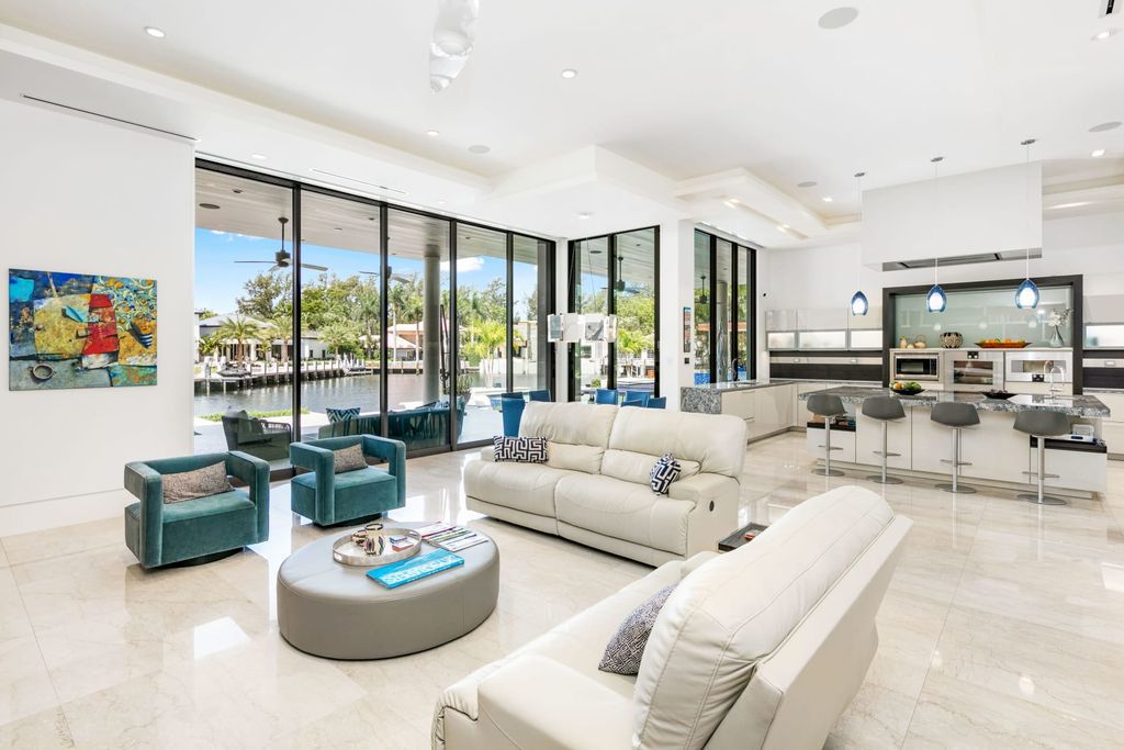 The Fort Lauderdale Home is a stunning estate nestled in the exclusive Bay Colony community perfect for entertaining now available for sale. This home located at 20 Compass Is, Fort Lauderdale, Florida
