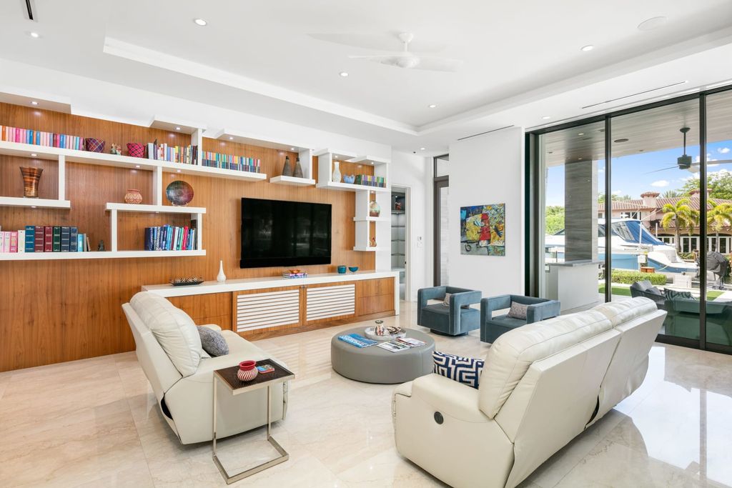 The Fort Lauderdale Home is a stunning estate nestled in the exclusive Bay Colony community perfect for entertaining now available for sale. This home located at 20 Compass Is, Fort Lauderdale, Florida