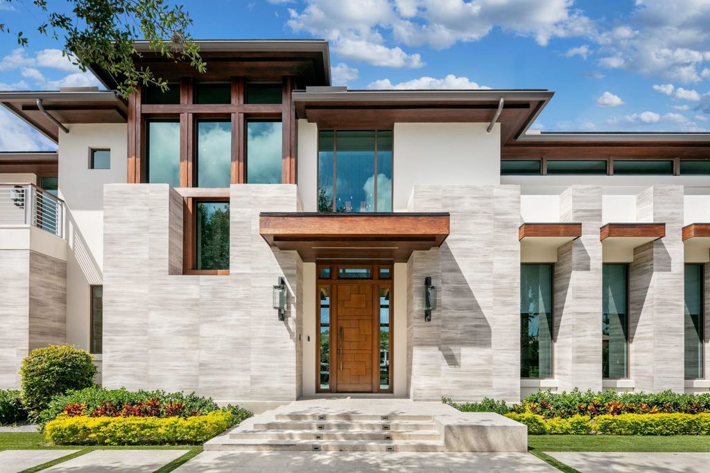 The Fort Lauderdale Home is a stunning estate nestled in the exclusive Bay Colony community perfect for entertaining now available for sale. This home located at 20 Compass Is, Fort Lauderdale, Florida