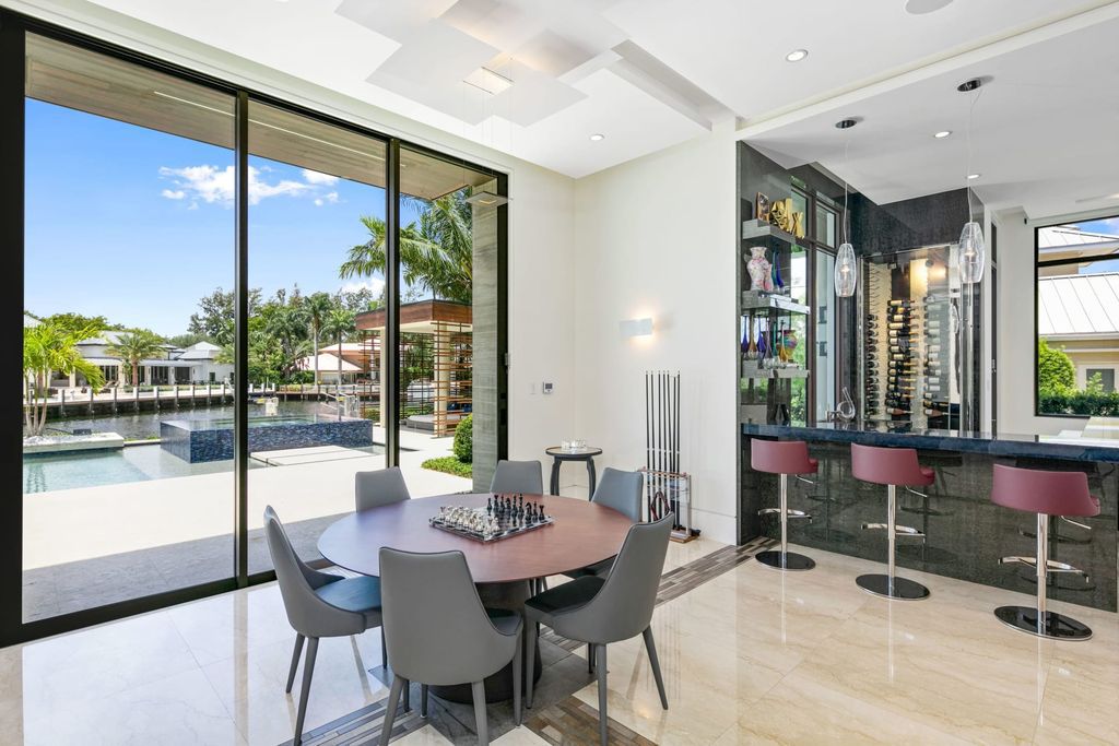The Fort Lauderdale Home is a stunning estate nestled in the exclusive Bay Colony community perfect for entertaining now available for sale. This home located at 20 Compass Is, Fort Lauderdale, Florida