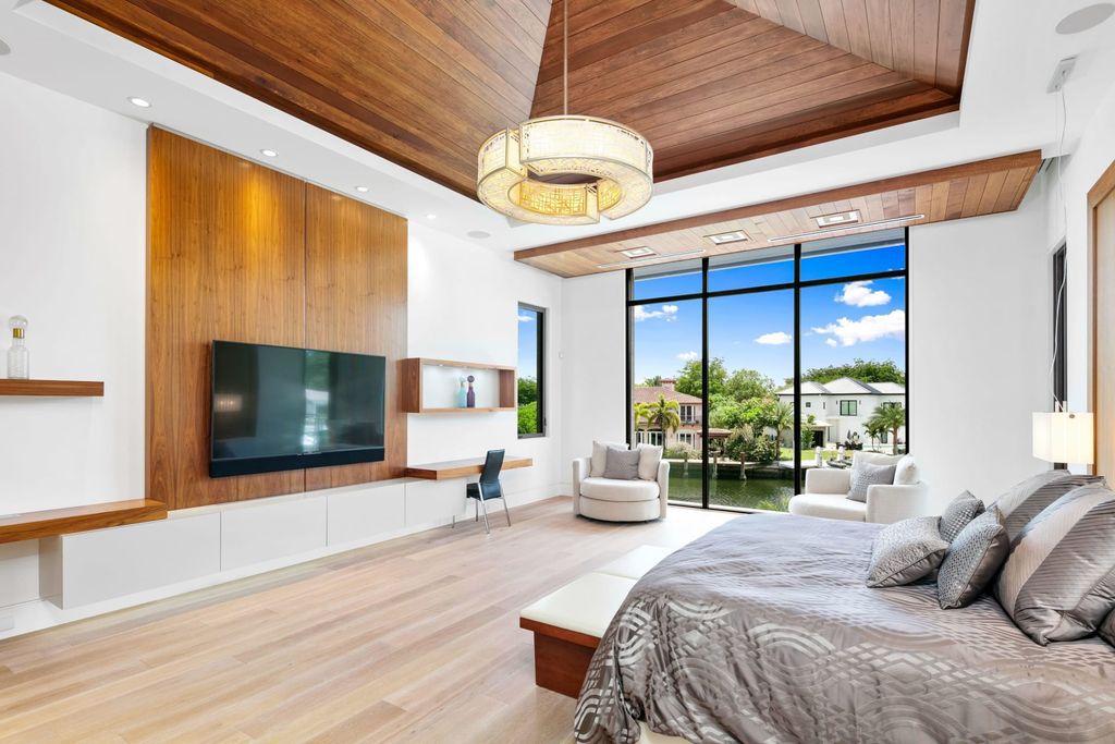 The Fort Lauderdale Home is a stunning estate nestled in the exclusive Bay Colony community perfect for entertaining now available for sale. This home located at 20 Compass Is, Fort Lauderdale, Florida