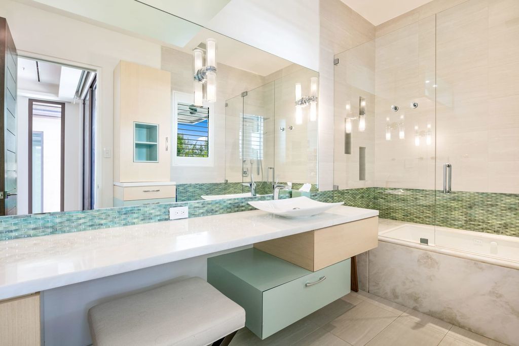 The Fort Lauderdale Home is a stunning estate nestled in the exclusive Bay Colony community perfect for entertaining now available for sale. This home located at 20 Compass Is, Fort Lauderdale, Florida