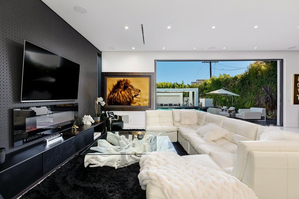 The Resort-like Home in Los Angeles is a sophisticated, high end property in Beverlywood featuring an open floor plan with unobstructed indoor-outdoor flow now available for sale. This home located at 9704 Cashio St, Los Angeles, California