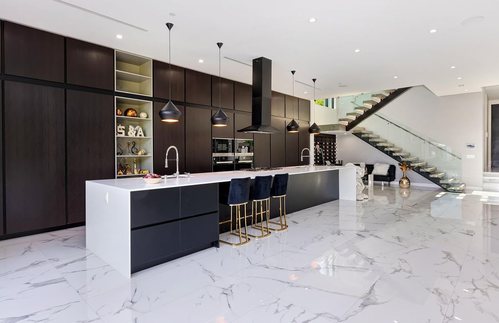 The Resort-like Home in Los Angeles is a sophisticated, high end property in Beverlywood featuring an open floor plan with unobstructed indoor-outdoor flow now available for sale. This home located at 9704 Cashio St, Los Angeles, California