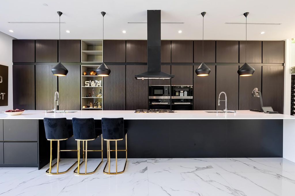 The Resort-like Home in Los Angeles is a sophisticated, high end property in Beverlywood featuring an open floor plan with unobstructed indoor-outdoor flow now available for sale. This home located at 9704 Cashio St, Los Angeles, California