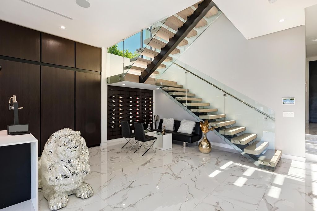 The Resort-like Home in Los Angeles is a sophisticated, high end property in Beverlywood featuring an open floor plan with unobstructed indoor-outdoor flow now available for sale. This home located at 9704 Cashio St, Los Angeles, California