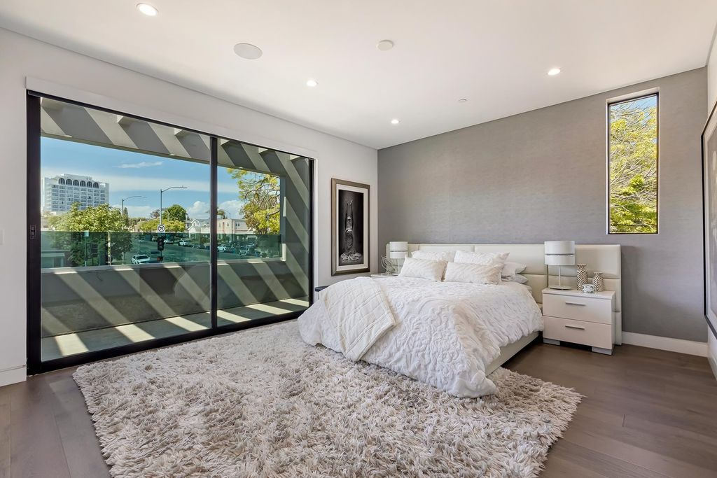 The Resort-like Home in Los Angeles is a sophisticated, high end property in Beverlywood featuring an open floor plan with unobstructed indoor-outdoor flow now available for sale. This home located at 9704 Cashio St, Los Angeles, California