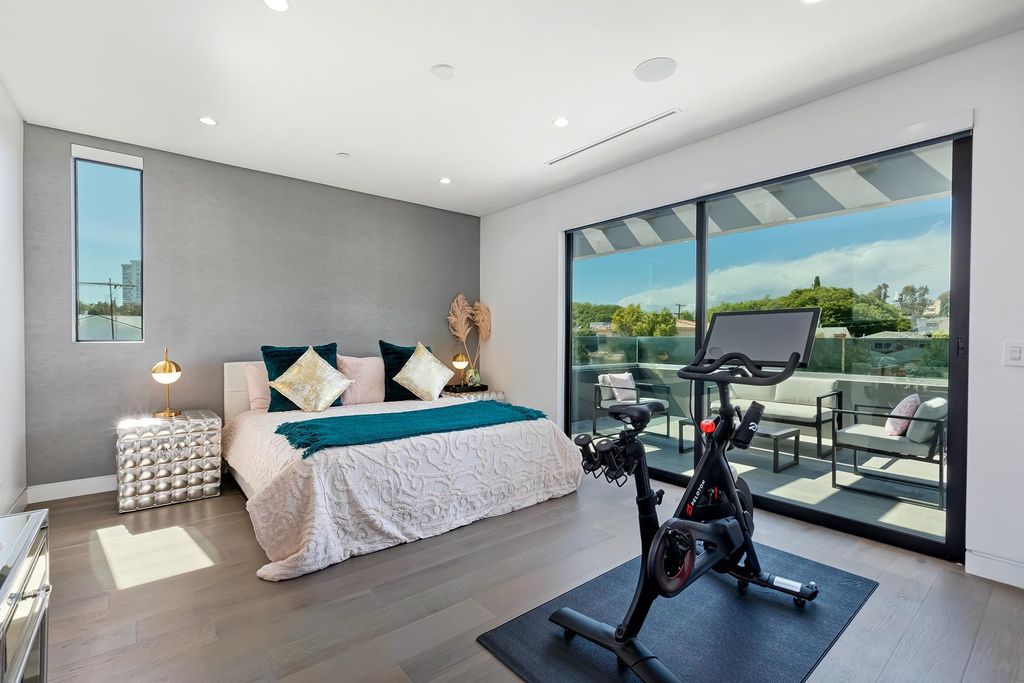 The Resort-like Home in Los Angeles is a sophisticated, high end property in Beverlywood featuring an open floor plan with unobstructed indoor-outdoor flow now available for sale. This home located at 9704 Cashio St, Los Angeles, California