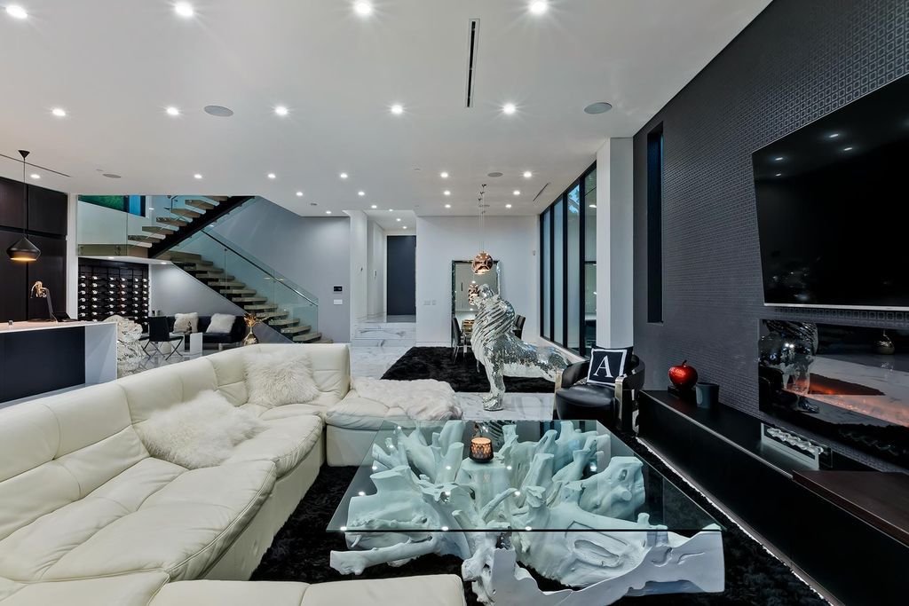 The Resort-like Home in Los Angeles is a sophisticated, high end property in Beverlywood featuring an open floor plan with unobstructed indoor-outdoor flow now available for sale. This home located at 9704 Cashio St, Los Angeles, California