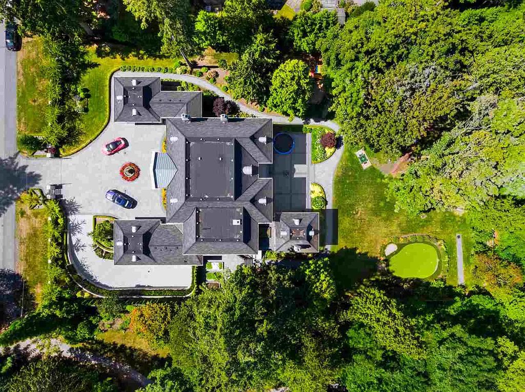 The Splendor French Style Estate in Surrey is one of the best homes on South Surrey's best street now available for sale. This home located at 13839 27th Ave, Surrey, BC V4P 1T2, Canada