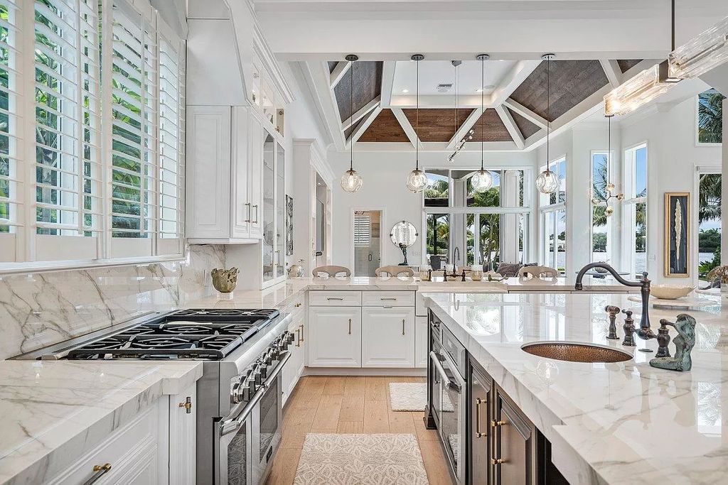 The Waterfront Home in North Palm Beach is a luxurious estate situated in gated Captains Key Community great for entertaining  now available for sale. This home located at 12014 Captains Lndg, North Palm Beach, Florida