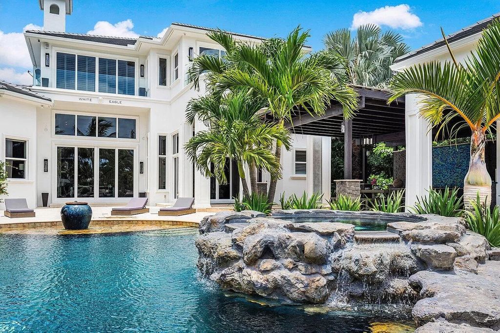 The Waterfront Home in North Palm Beach is a luxurious estate situated in gated Captains Key Community great for entertaining  now available for sale. This home located at 12014 Captains Lndg, North Palm Beach, Florida