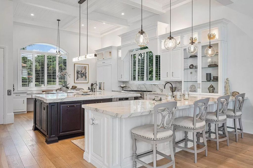 The Waterfront Home in North Palm Beach is a luxurious estate situated in gated Captains Key Community great for entertaining  now available for sale. This home located at 12014 Captains Lndg, North Palm Beach, Florida