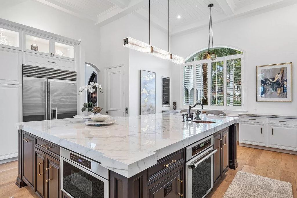 The Waterfront Home in North Palm Beach is a luxurious estate situated in gated Captains Key Community great for entertaining  now available for sale. This home located at 12014 Captains Lndg, North Palm Beach, Florida