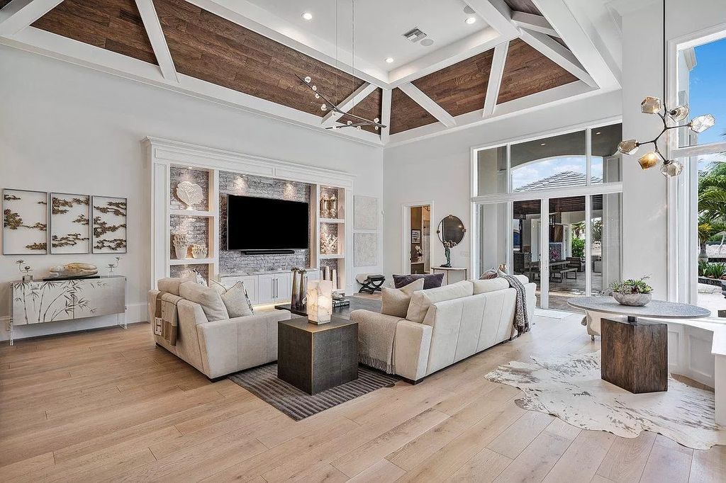 The Waterfront Home in North Palm Beach is a luxurious estate situated in gated Captains Key Community great for entertaining  now available for sale. This home located at 12014 Captains Lndg, North Palm Beach, Florida