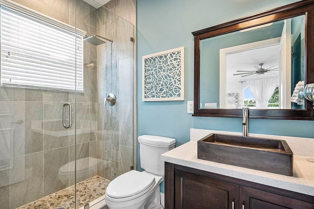 The Waterfront Home in North Palm Beach is a luxurious estate situated in gated Captains Key Community great for entertaining  now available for sale. This home located at 12014 Captains Lndg, North Palm Beach, Florida