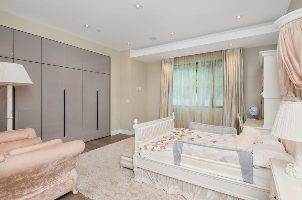 The Contemporary Home in Beverly Hills with panoramic views is built with soaring ceilings, clean lines, and sleek intricacies now available for sale. This home located at 1041 N Hillcrest Rd, Beverly Hills, California