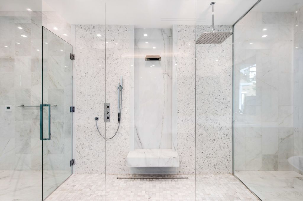 The Contemporary Home in Beverly Hills with panoramic views is built with soaring ceilings, clean lines, and sleek intricacies now available for sale. This home located at 1041 N Hillcrest Rd, Beverly Hills, California