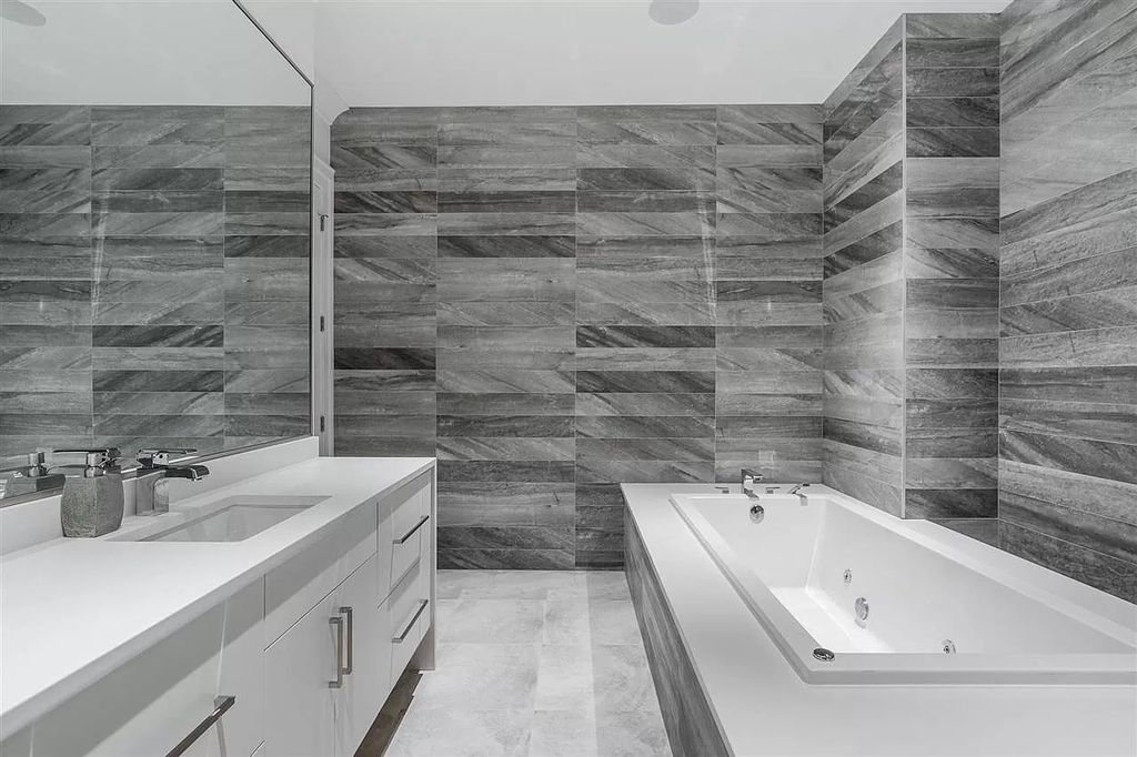 The Enthralling Unparalleled Residence in Surrey is a grand-scale luxury home now available for sale. This home located at 14383 28th Ave, Surrey, BC V4P 2H2, Canada
