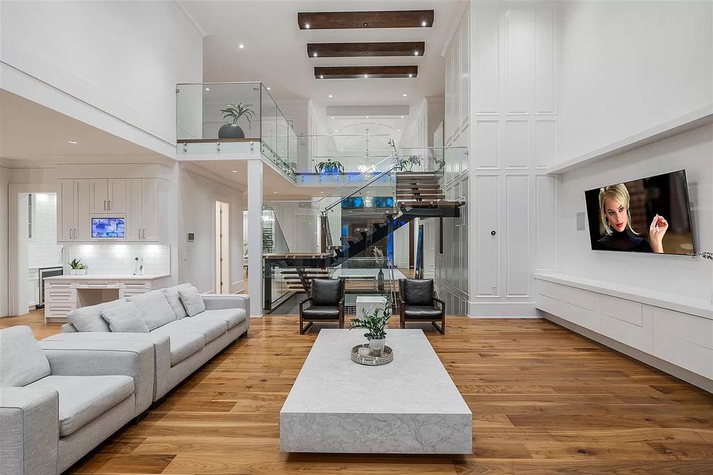 The Enthralling Unparalleled Residence in Surrey is a grand-scale luxury home now available for sale. This home located at 14383 28th Ave, Surrey, BC V4P 2H2, Canada