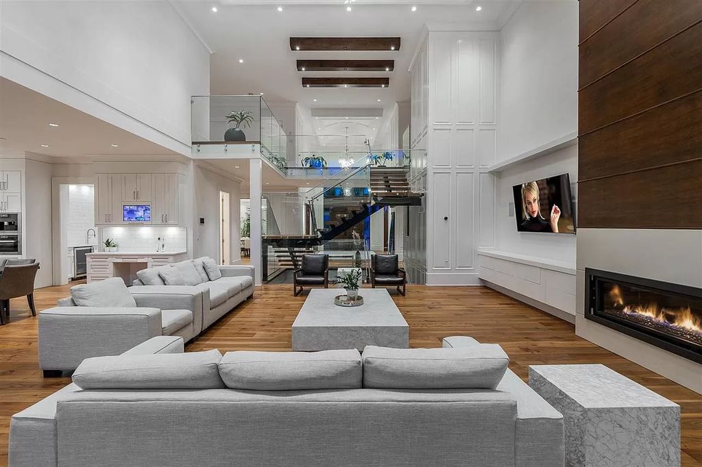 The Enthralling Unparalleled Residence in Surrey is a grand-scale luxury home now available for sale. This home located at 14383 28th Ave, Surrey, BC V4P 2H2, Canada