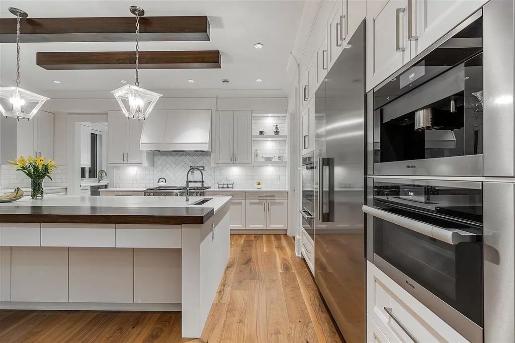 The Enthralling Unparalleled Residence in Surrey is a grand-scale luxury home now available for sale. This home located at 14383 28th Ave, Surrey, BC V4P 2H2, Canada