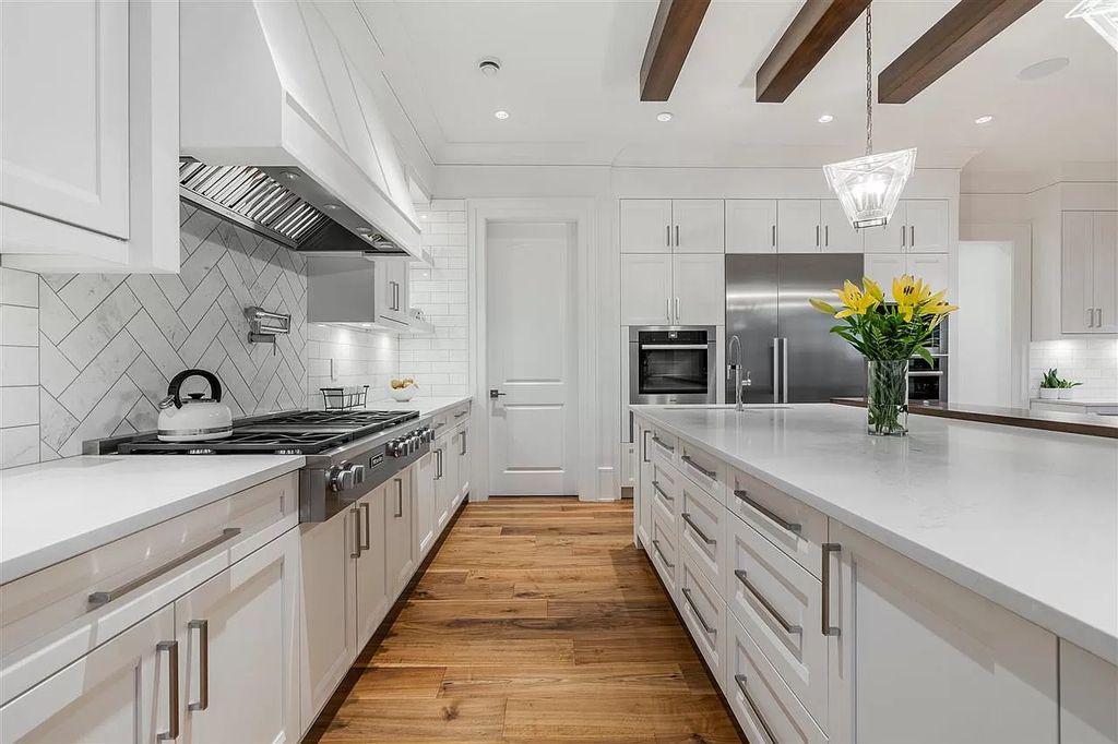The Enthralling Unparalleled Residence in Surrey is a grand-scale luxury home now available for sale. This home located at 14383 28th Ave, Surrey, BC V4P 2H2, Canada