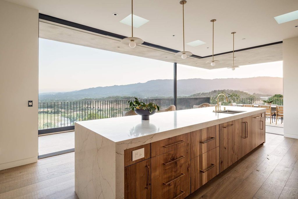 The Glen Ellen Modern Home is a 15-acre hillside Sonoma Valley property in a classic California setting with dramatic views now available for sale. This home located at 500 Aurora Ln, Glen Ellen, California