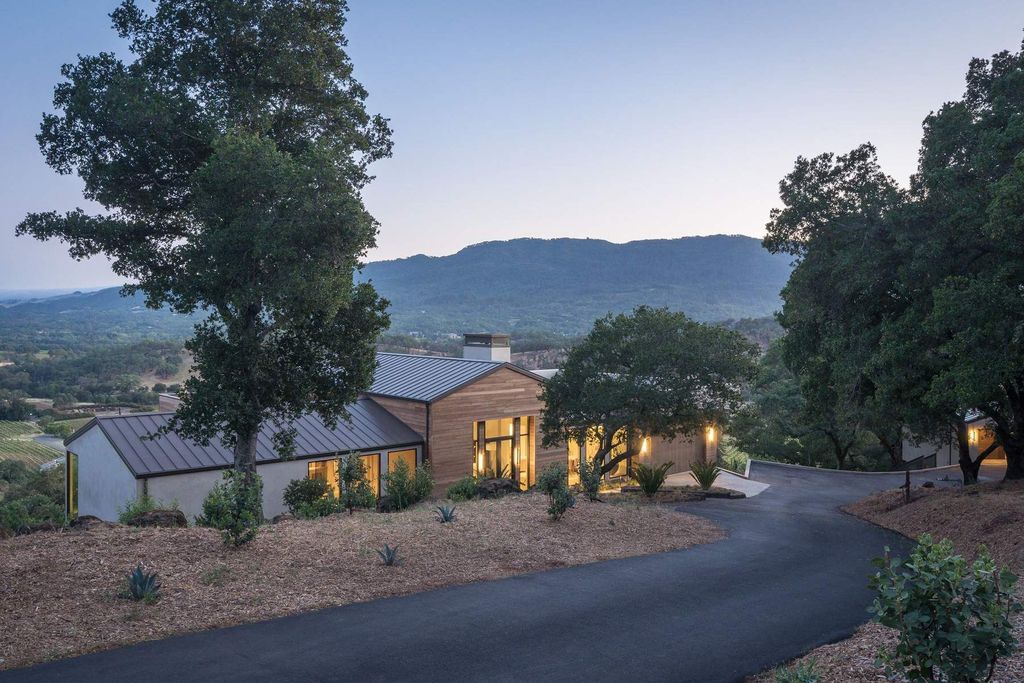 The Glen Ellen Modern Home is a 15-acre hillside Sonoma Valley property in a classic California setting with dramatic views now available for sale. This home located at 500 Aurora Ln, Glen Ellen, California