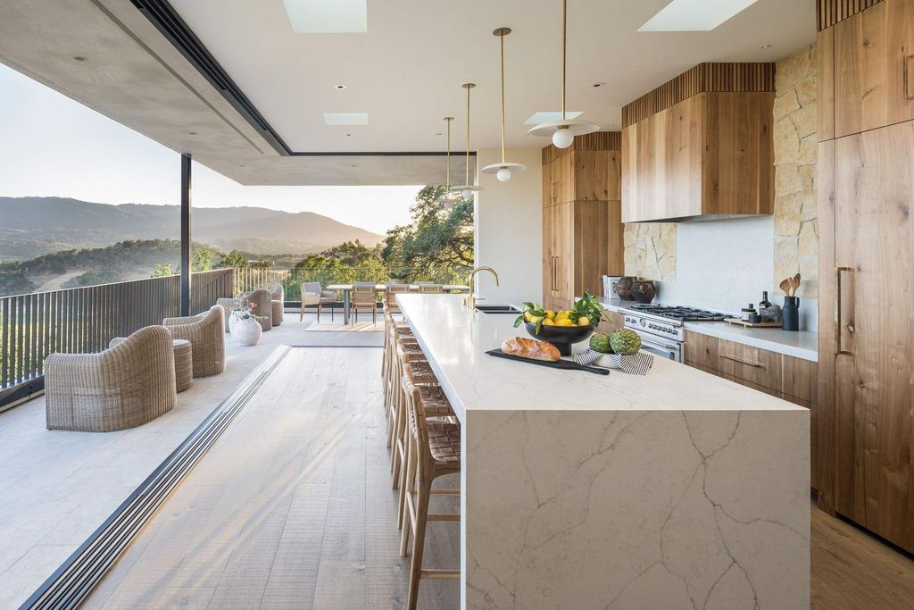 The Glen Ellen Modern Home is a 15-acre hillside Sonoma Valley property in a classic California setting with dramatic views now available for sale. This home located at 500 Aurora Ln, Glen Ellen, California