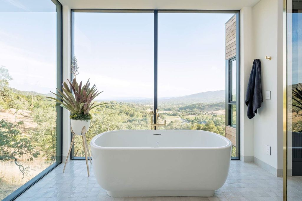 The Glen Ellen Modern Home is a 15-acre hillside Sonoma Valley property in a classic California setting with dramatic views now available for sale. This home located at 500 Aurora Ln, Glen Ellen, California
