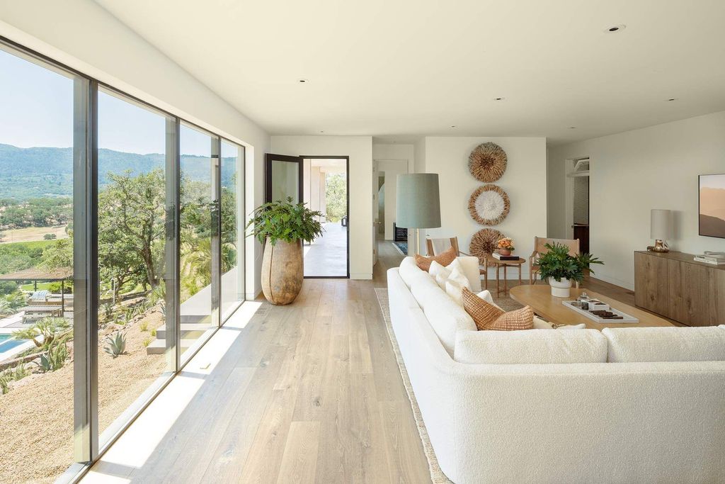 The Glen Ellen Modern Home is a 15-acre hillside Sonoma Valley property in a classic California setting with dramatic views now available for sale. This home located at 500 Aurora Ln, Glen Ellen, California