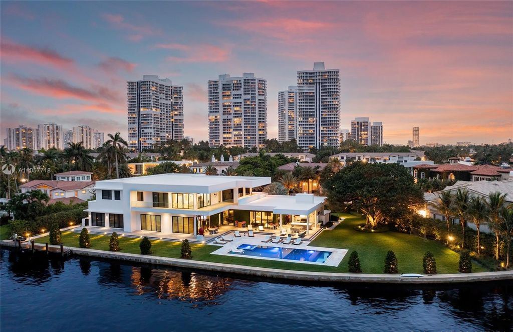 This Mansion in Golden Beach is a modern tropical oasis is situated on a wide canal with breathtaking water views available for sale. This home located at 660 N Island, Golden Beach, Florida
