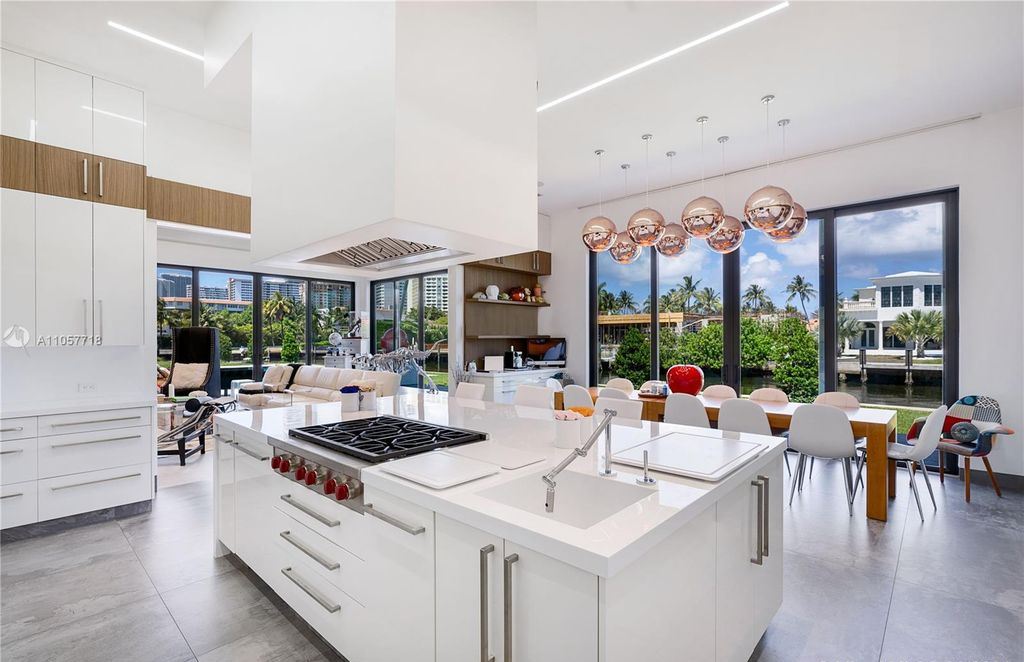 This Mansion in Golden Beach is a modern tropical oasis is situated on a wide canal with breathtaking water views available for sale. This home located at 660 N Island, Golden Beach, Florida