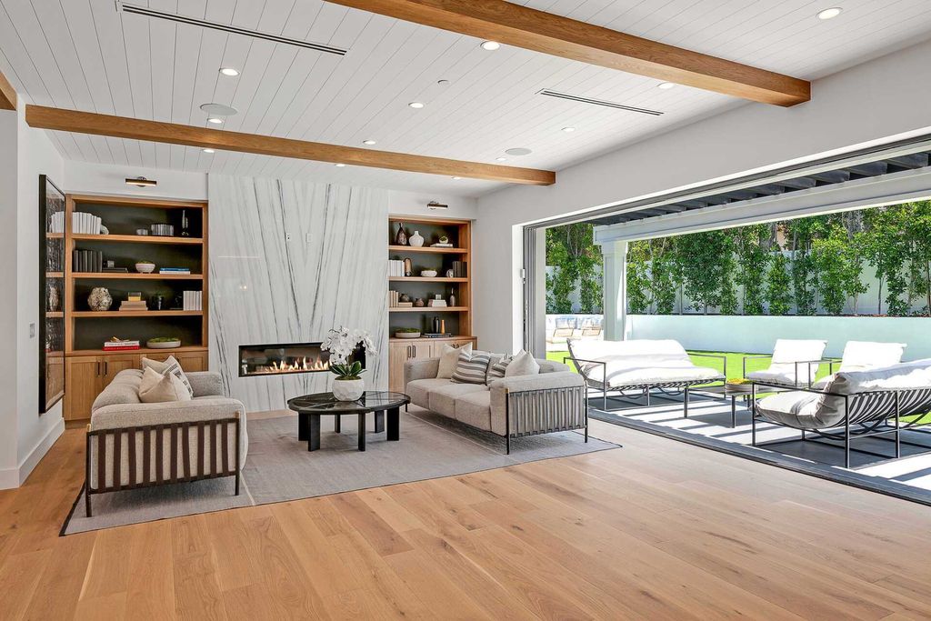 The Farmhouse in Los Angeles is a newly constructed modern property with sweeping views of the iconic Hollywood Sign now available for sale. This home located at 6310 Mirror Lake Dr, Los Angeles, California
