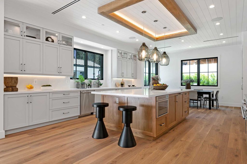 The Farmhouse in Los Angeles is a newly constructed modern property with sweeping views of the iconic Hollywood Sign now available for sale. This home located at 6310 Mirror Lake Dr, Los Angeles, California