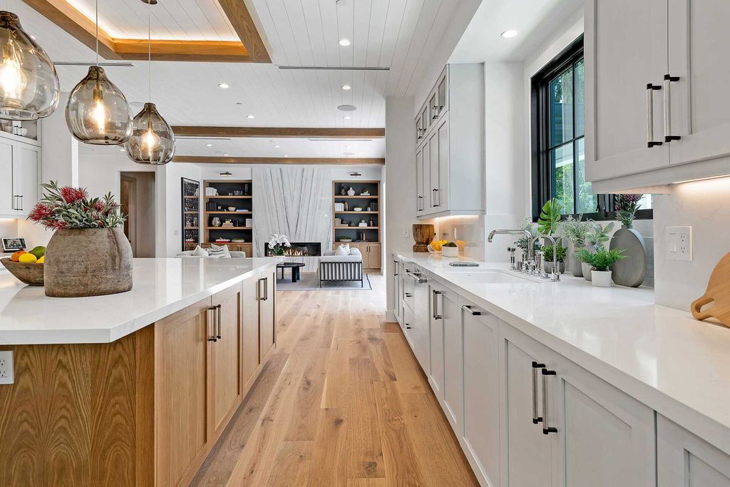 The Farmhouse in Los Angeles is a newly constructed modern property with sweeping views of the iconic Hollywood Sign now available for sale. This home located at 6310 Mirror Lake Dr, Los Angeles, California