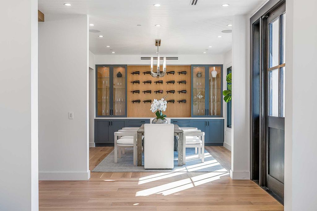 The Farmhouse in Los Angeles is a newly constructed modern property with sweeping views of the iconic Hollywood Sign now available for sale. This home located at 6310 Mirror Lake Dr, Los Angeles, California